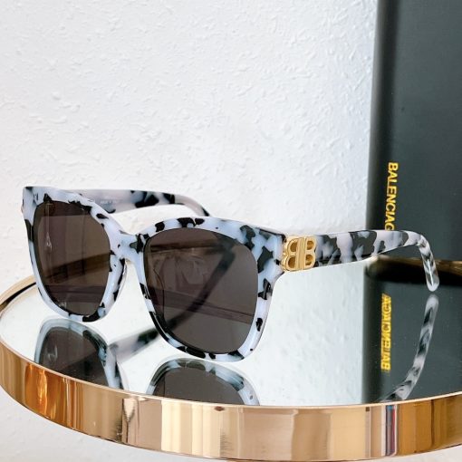 Balenciaga. Acetate round-frame sunglasses. In white.