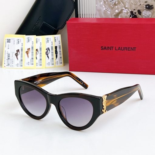 SAINT LAURENT. The temples are decorated with CASSANDRE hinges. Made of metal and acetate. In an irregular shape. Women's sunglasses. In tortoiseshell color. - Image 3