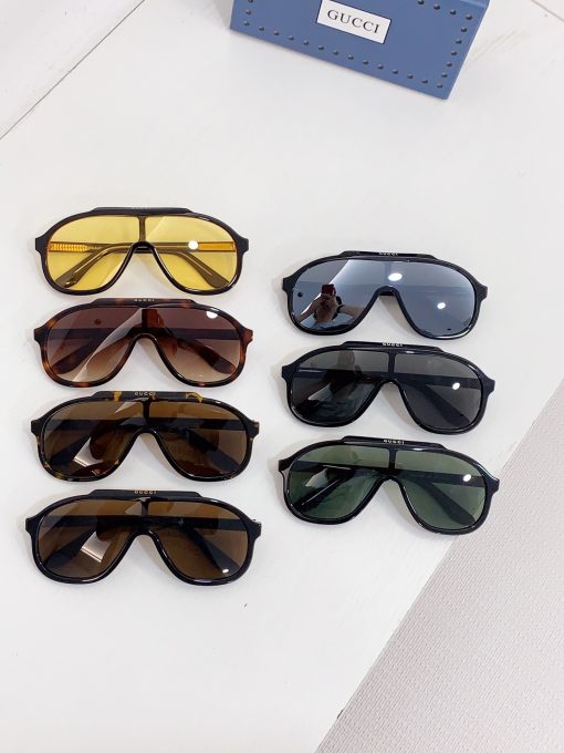 GUCCI. Acetate material. Aviator-style sunglasses. For men. In black.