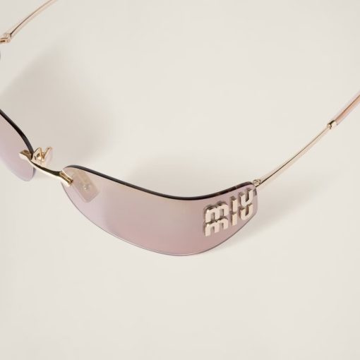 MIU MIU. Provides full protection against UVA and UVB. Irregular-shaped. Women's sunglasses. In gold color. - Image 5