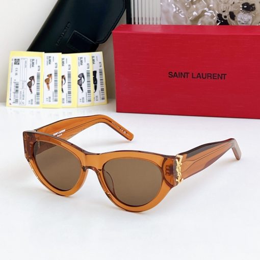 SAINT LAURENT. The temples are decorated with CASSANDRE hinges. Made of metal and acetate. In an irregular shape. Women's sunglasses. In tortoiseshell color. - Image 9
